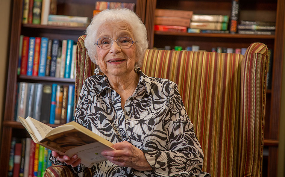 Independent Lansdale area senior reading a book
