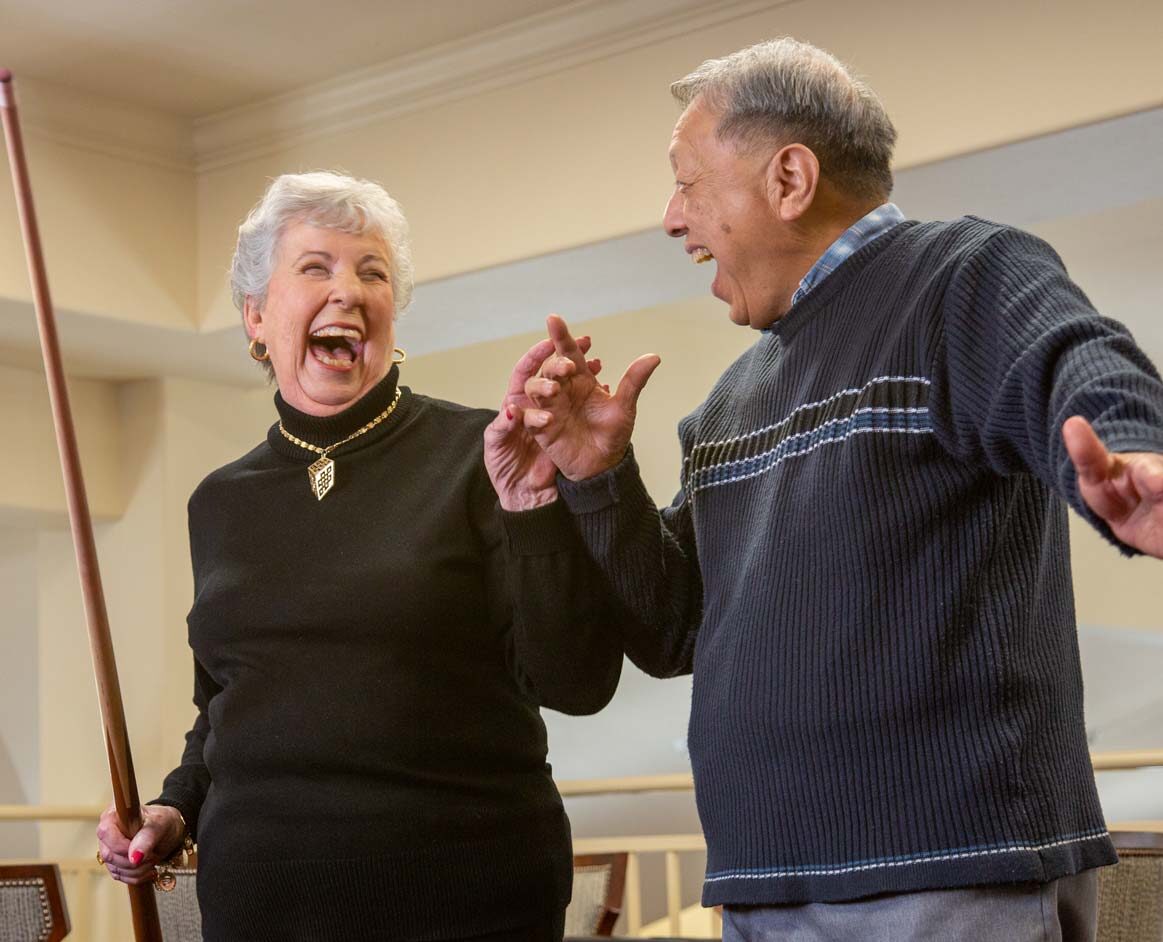 Hudson Estates seniors playing billiards